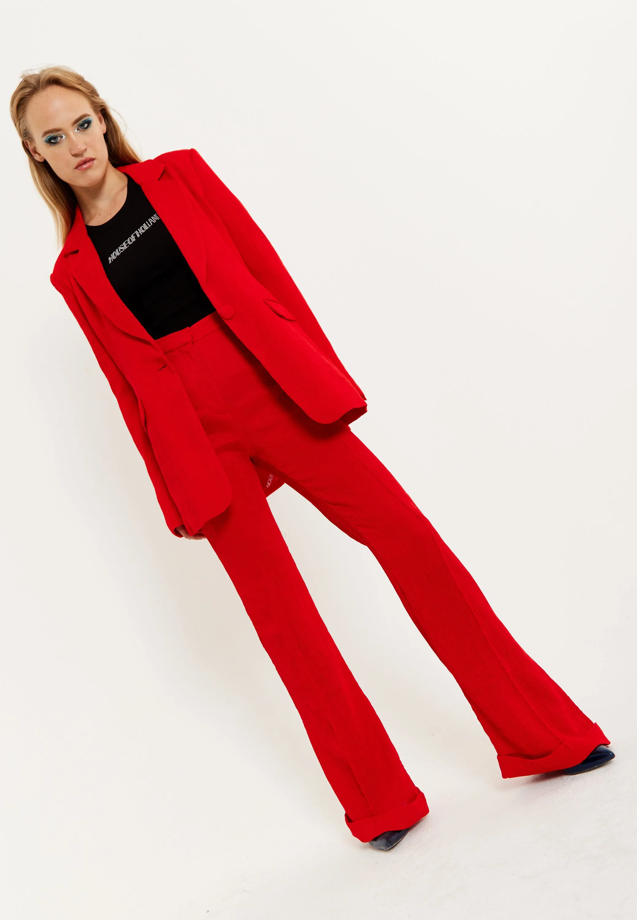 Sure, heres an optimized product title with modifiers:

Stylish Red Flare Trousers by House of Holland for a Bold Fashion Statement