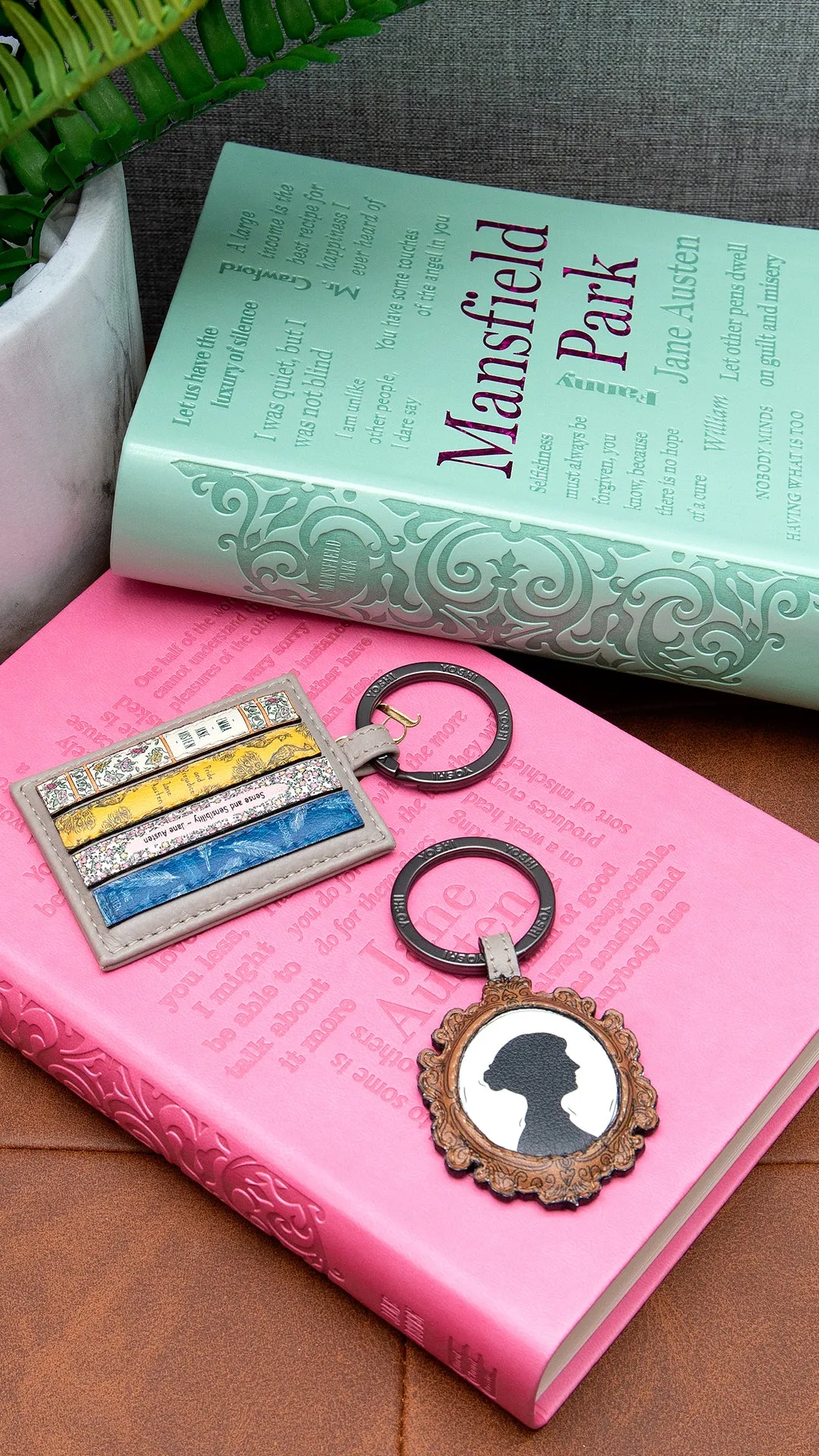 Jane Austen Bookworm Silhouette Warm Grey Leather Keyring