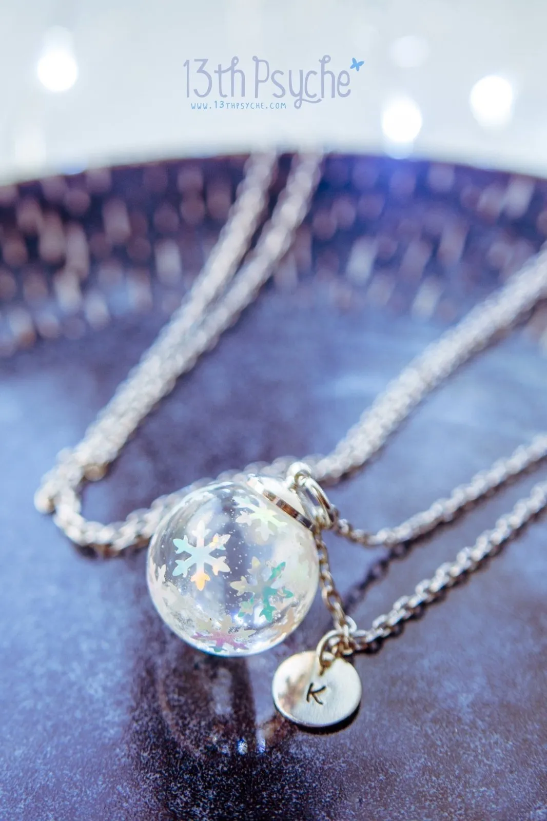 Winter inspired snowflake resin ball necklace